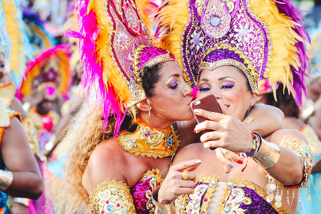 Carnival in Rio with Intrepid Travel - performers in the parade take a selfie