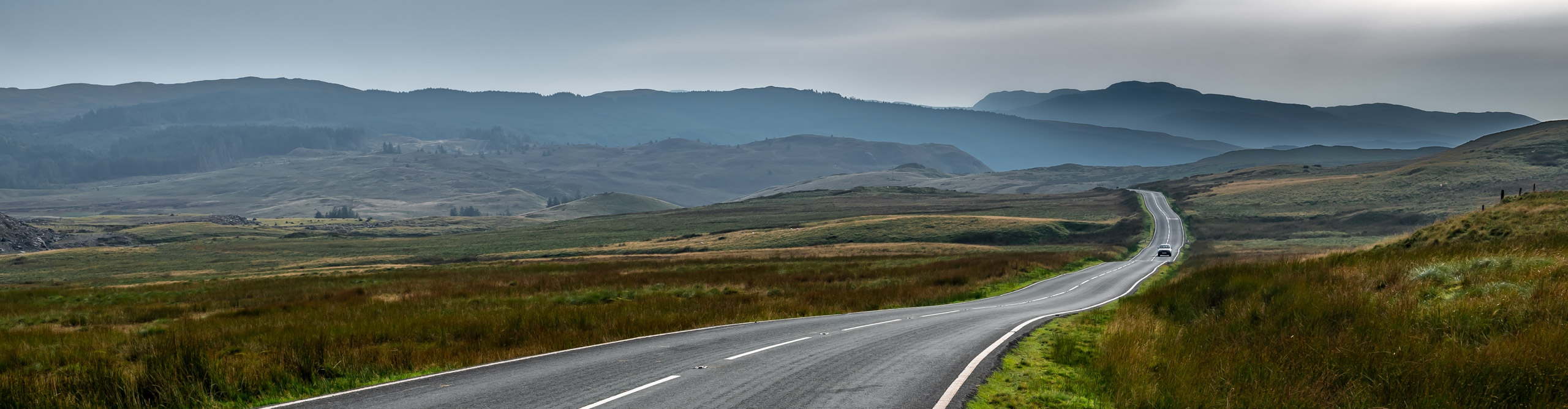 Road Through Spectacular Rural Landscape Of Snowdonia National Park In North Wales, United Kingdon