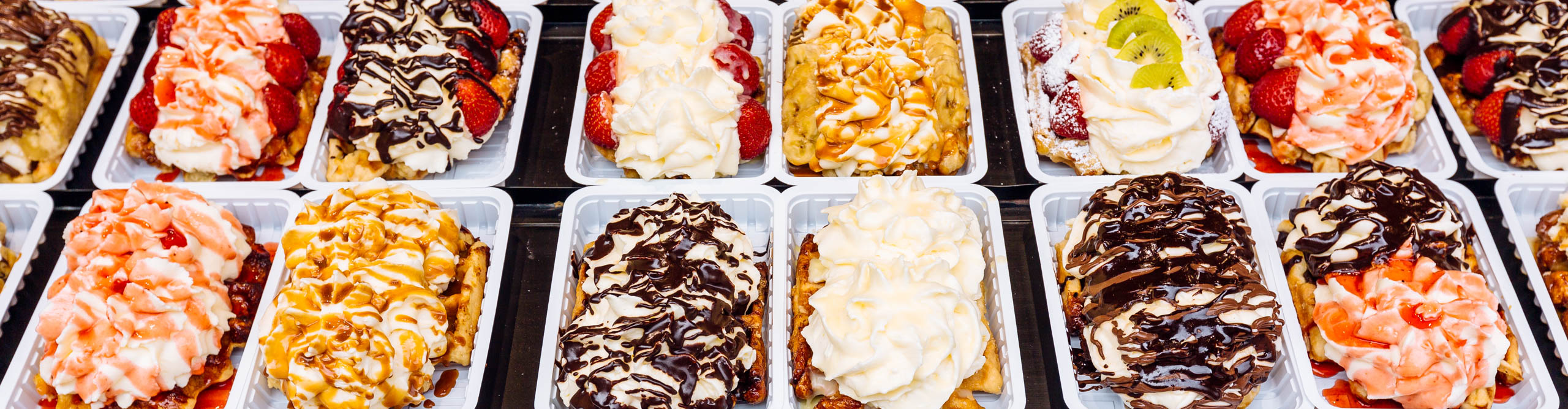 Belgian waffles with various sweet toppings for sale, Brussels, Belgium