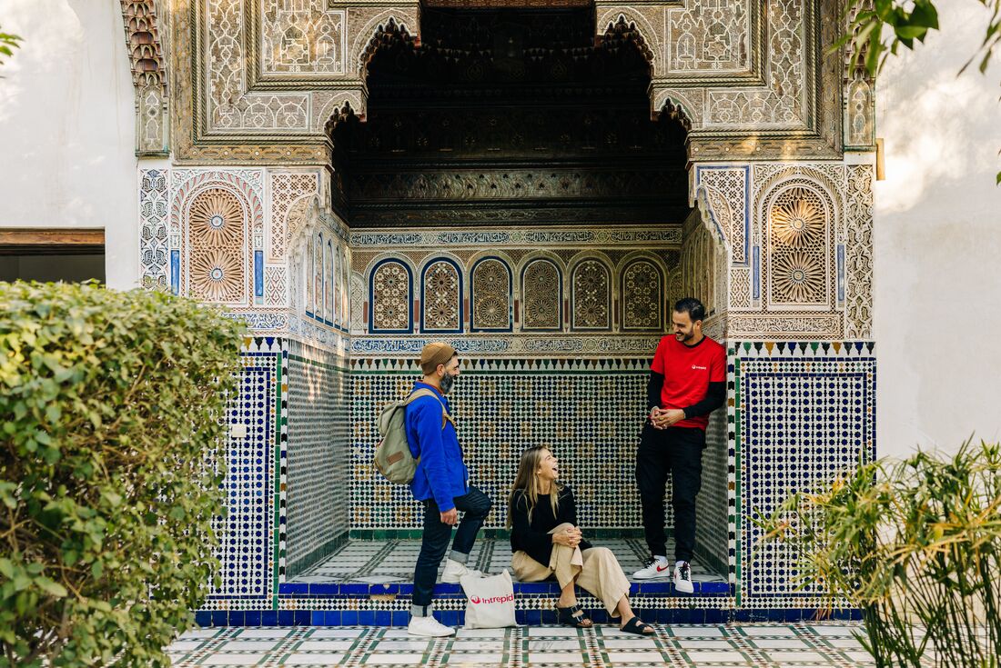 Leader and Intrepid travellers relax in a riad in Marrakech, Morocco
