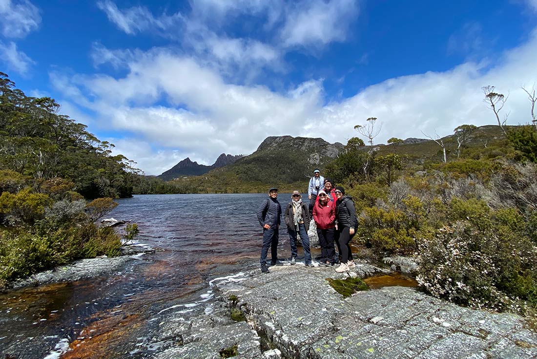 Travellers posing along the Cradle Mountain Trail