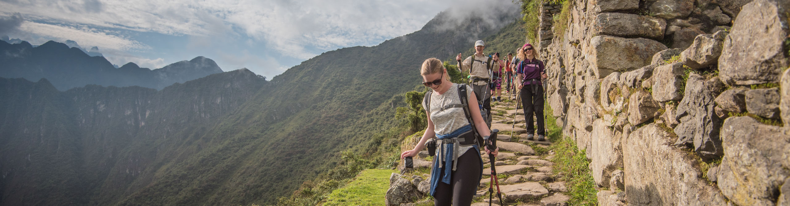 Travellers walking along the Inca Trail on the way to Machu Picchu, Peru