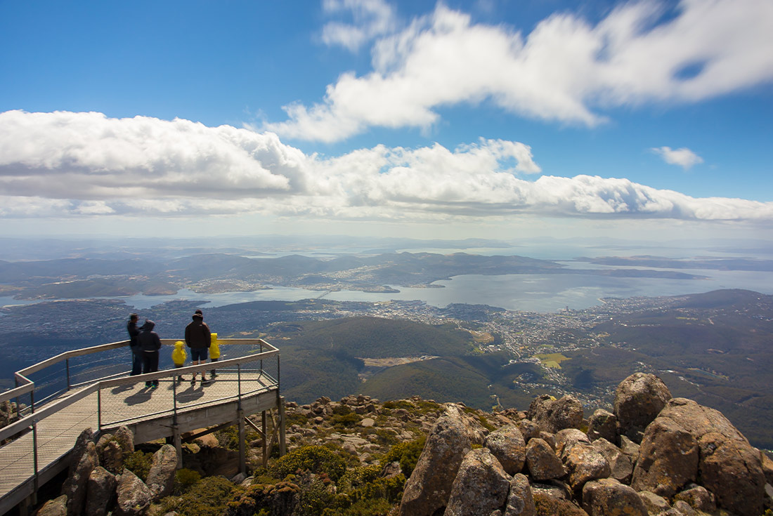 PUKH - Travellers looking over Tasmania from Mount Wellington