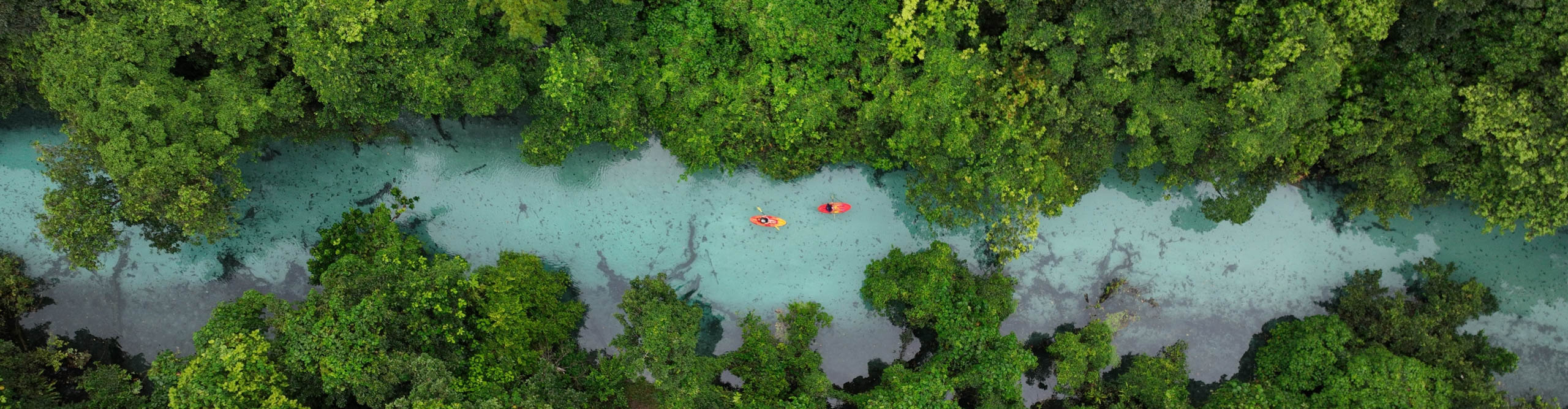 Aerial view of people kayaking along ga river in Vanuatu