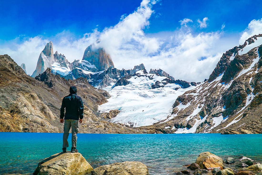 Man standing in front of Mount Cerro Paine viewpoint, Torres del Paine NP, Chile