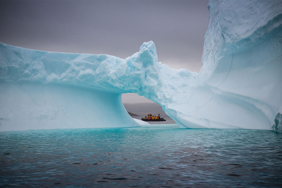 Zodiac cruising amongst the iceberg off Greenland's coast